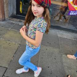 Annabelle picked up a new hat from the souvenir shop outside the castle gates