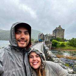 Still dryjng to stay dry in front of another castle