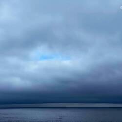 Could it be clearing? Nah! Just a passing fancy ilas we cruise the Bering Sea.