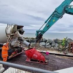 Concrete pouring for coastal sea defence works east of Colwyn Bay