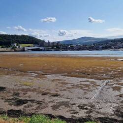 Conwy castle, bridges and town from Traeth Melyn beach, Llandudno