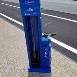 Bicycle pump and tools on the beach front cycle path