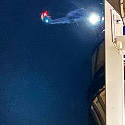 Sadly, helicopter airlifting a passenger