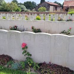 Adjoing graves means these soldiers were buried in a mass grave at this spot.