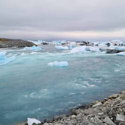 Here you can see the water rushing past the damn of ice on its way to the sea.
