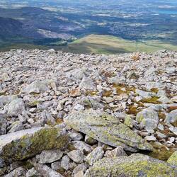 West from Carnedd Dafydd toward Anglesey/Ynos Môn illustrating very stoney surface