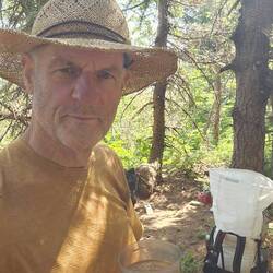 Trying my best to take a coffee break in a dream location. Impossible! Flies, flies, mosquitos