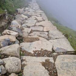 Cloud had been high all the way up then lowered to create a not unfamilar scene of path in cloud