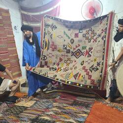 Now show time. This is a large rug & no set pattern used. It's each woman's own design, no two alike