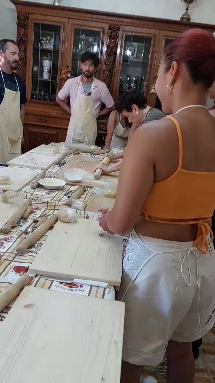 Nonna showing us the traditional way of rolling pasta