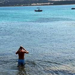 This is Dale about to swim out to collect our boat from the mooring