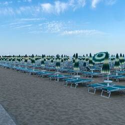 Liege um Liege und Sonnenschirm um Sonnenschirm