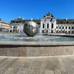 Earth - planet of peace at  Hodzova Namestie with Presidential Palace in background
