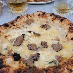 You need 'smell-o-vision' for this ... a black truffle pizza. Sensational!