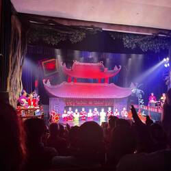 The puppeteers and orchestra