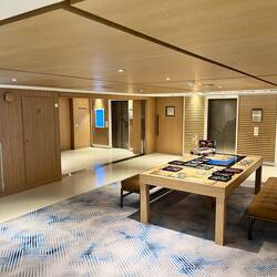 Big work/play table on deck 3 amidships where puzzles are assembled