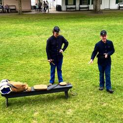 Re-enactors Explaining the Uniform and Supplies