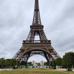 Eiffel Tower the day after a big celebration. Litter everywhere.