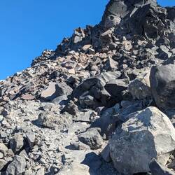 Last scramble to the top of old snowy