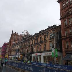 Love the metal sculpture over this building