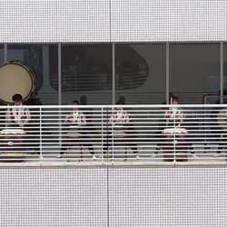 Drumming as Insignia slides away from its berth — Kobe, Japan.