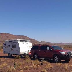 Camped on the red gravel. Again.