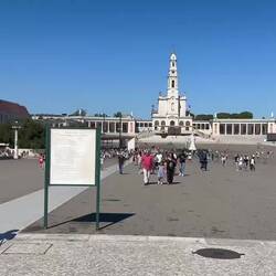 Worshipers crawling on their knees praying to the Virgin for help or thanking her for the help recei