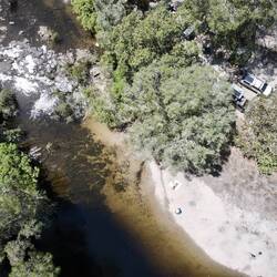 Lovely shady camp by the river