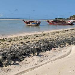 Local fishing boats await the tide