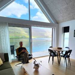 Relaxing in our boathouse accommodation