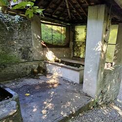 Near the top - centuries-old water basin and horse trough. Trail on the right