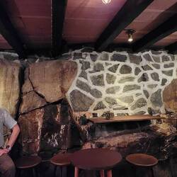 Lower area of Mikkeller Bar. They built right over the rock. It's 400 years old 🍻