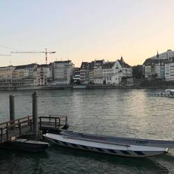 Boat in center of river is attached to a cable and moves people back/forth using just the current!