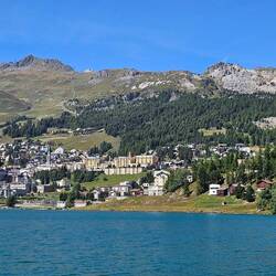 Notice the funicular and cable car route on the mountains behind the city