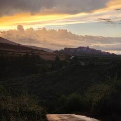 Last night's village with the sun rising behind it.