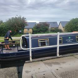 Randy taking the boat through the swing bridge