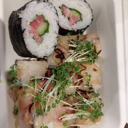 My to-go-box with Sushi after finishing the cooking session