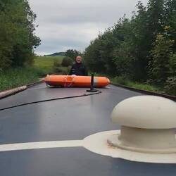 Randy is really enjoying piloting our boat.