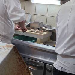 Chef's preparing in front of us