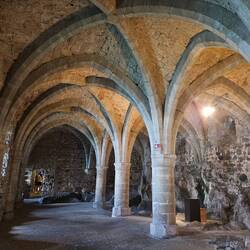 Cellars - built on natural stone and enhanced with gothic arches dating to 11th century