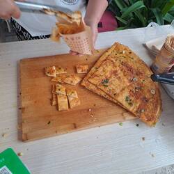 Heute zum Frühstück: Pizza, chinesisch interpretiert