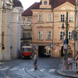 Trams on the left, cars in the middle, people on the right. A place for everyone.