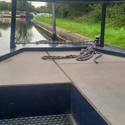 Back deck. We spent most of our time here steering the boat. Set the guidebook on the coach roof.