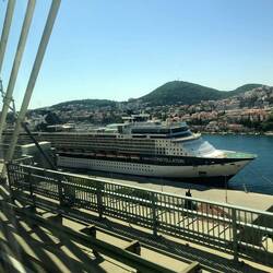 Cruise ship in Dubrovnik harbor near bus depot