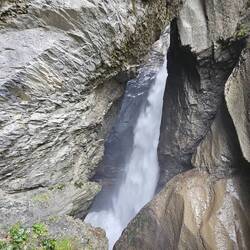 Torrents of water surge out and down