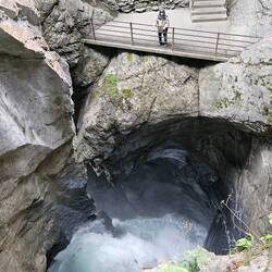 Top of a chute/fall, looking down. Charlie on lower level (in the rain)