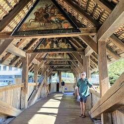 Charlie and paintings on Mill Bridge
