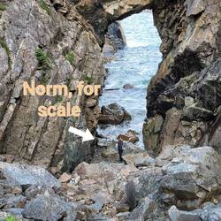 NORM FOR SCALE. HE CLIMBED DOWN AND SCOOPED UP SOME OCEAN WATER!