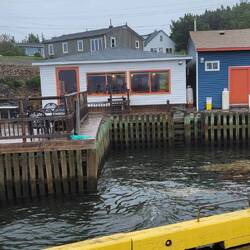 THE BACK VIEW OF THE DECK AND DINING ROOM AT SANSOME'S. THE INSIDE WAS JUST AS NO-NONSENSE.