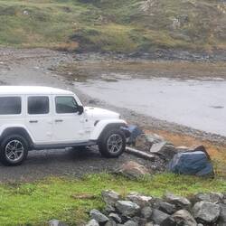 ADMIRING OUR RENTAL CAR WHEN WE STOPPED AT THE COTTAGE FOR DRY CLOTHES BEFORE DINNER